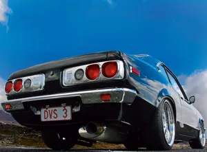 Sleek Vintage Mazda Rx-3 In Action Wallpaper