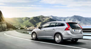 Sleek Volvo V60 Parked In Urban Scenery= Wallpaper