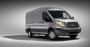 Sleek White Ford Transit On The Move Wallpaper