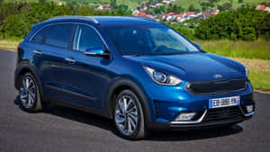 Sleek White Kia Niro - The Ultimate Hybrid Crossover Suv Wallpaper