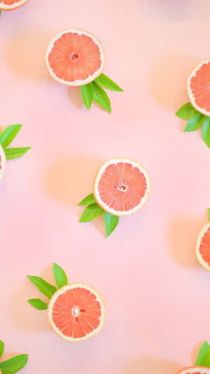 Sliced Pink Grapefruit Wallpaper Wallpaper