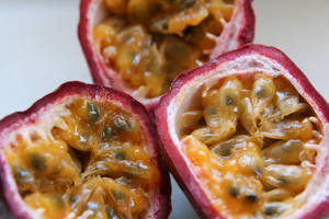 Sliced Ripe Passion Fruit Close Up Wallpaper