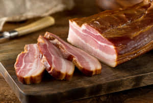 Sliced Smoked Baconon Cutting Board Wallpaper