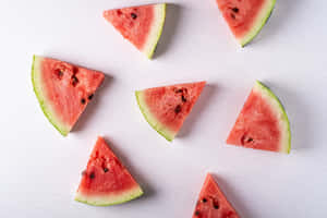 Sliced Watermelon Pieces Arrangement Wallpaper