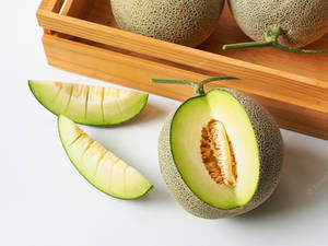 Slices Of Fresh Honeydew Melon Wallpaper