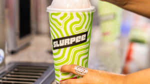 Slurpee Cupin Hand Wallpaper