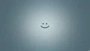 Smiley Face On Gray Gradient Background Wallpaper