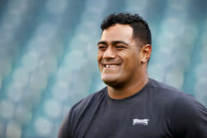 Smiling Athlete Jordan Mailata Wallpaper