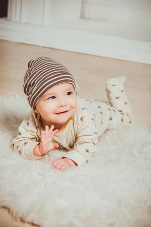 Smiling Babyin Striped Hat Wallpaper