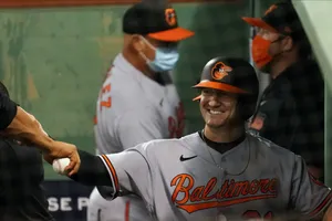 Smiling Baseball Player Baltimore Orioles Wallpaper