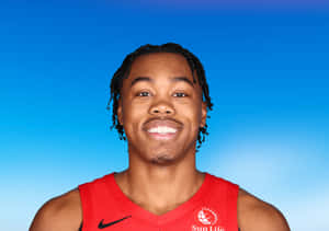 Smiling Basketball Player Portrait Wallpaper