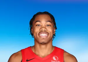 Smiling Basketball Player Portrait Wallpaper