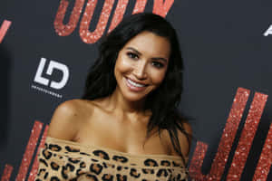 Smiling Celebrity Leopard Dress Event Wallpaper