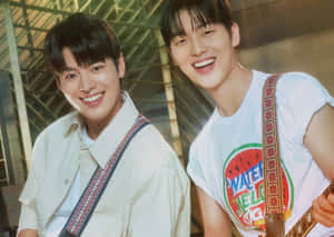 Smiling Duo Summer Vibes Wallpaper