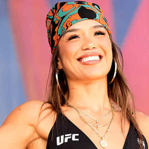 Smiling Female Athlete U F C Apparel Wallpaper