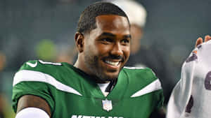 Smiling Football Player Elijah Moore Wallpaper