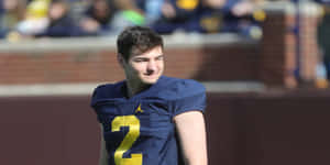 Smiling Football Player Number2 Wallpaper