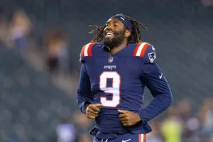 Smiling Football Player Number9 Wallpaper