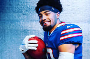 Smiling Football Player Portrait Wallpaper