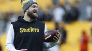 Smiling Football Player Steelers Outfit Wallpaper