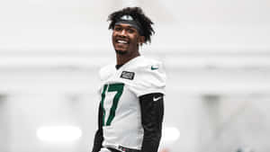 Smiling Football Player Wearing Number17 Jersey Wallpaper