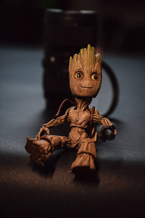 Smiling Groot Figurine Wallpaper