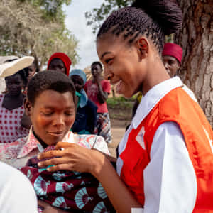 Smiling Humanitarian Worker Wallpaper