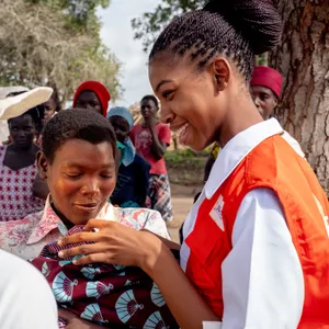 Smiling Humanitarian Worker Wallpaper