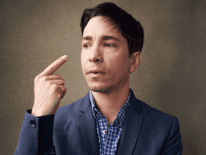 Smiling Justin Long In Casual Attire Wallpaper