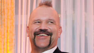 Smiling_ Man_ In_ Tuxedo.jpg Wallpaper