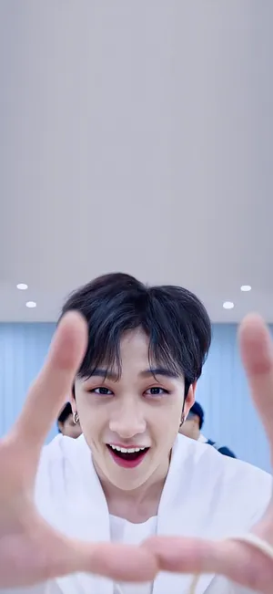 Smiling Man Reaching Out Portrait Wallpaper