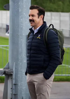 Smiling Man With Mustache Outdoors Wallpaper