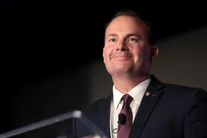 Smiling Manat Podium Speech Wallpaper