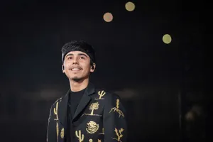 Smiling Manin Embroidered Jacket Wallpaper