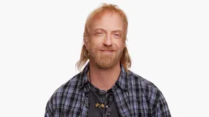 Smiling Manin Plaid Shirt Wallpaper