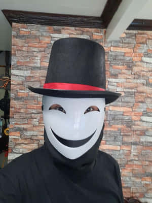 Smiling Maskwith Top Hat Wallpaper