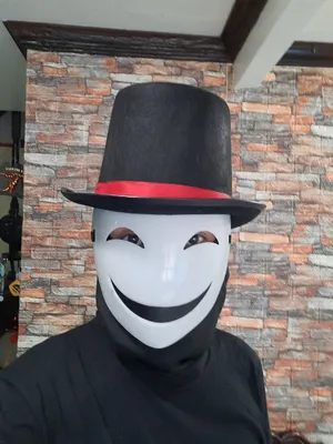 Smiling Maskwith Top Hat Wallpaper