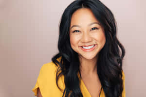 Smiling Woman Yellow Top Portrait Wallpaper