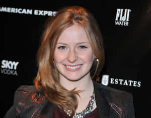 Smiling Womanat Event Wallpaper