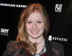 Smiling Womanat Event Wallpaper