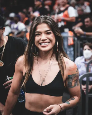 Smiling Womanat Sporting Event Wallpaper