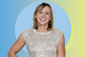 Smiling Womanin Silver Dress Wallpaper