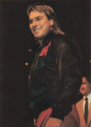 Smiling Wrestlerin Black Jacket Wallpaper