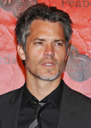 Smirking Timothy Olyphant Wallpaper