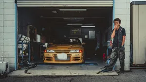 Smokey Nagata And Gold Car Wallpaper