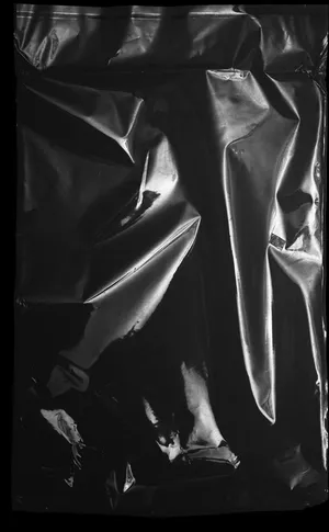 Smooth And Elegant Black Plastic Wallpaper