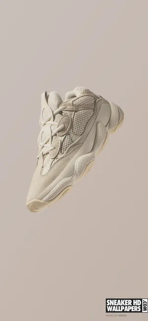 Sneaker Yeezy 500 Floating Diagonally Wallpaper