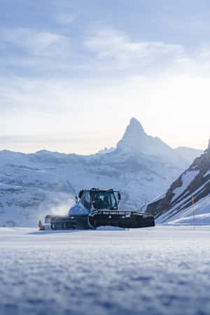 Snowplow Clearing A Winter Road Wallpaper