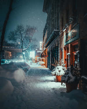 Snowy Evening Cafe Scene.jpg Wallpaper