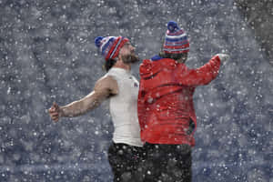 Snowy Football Celebration Wallpaper